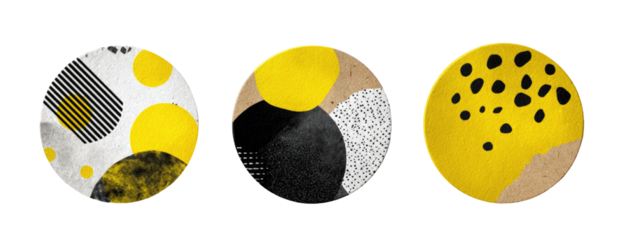 Three circular plates with abstract yellow, black, and white designs - Powered by Adobe