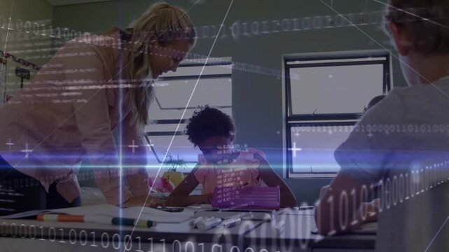 Instructor leaning over desk pointing workbook guiding while classroom binary overlay playing