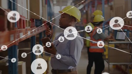 warehouse worker scanning boxes and causing animated user icons linking across shelves and aisle - Powered by Adobe