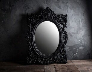 Ornate black mirror on dark wooden floor