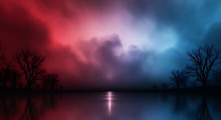 Ethereal red and blue clouds reflecting on water at dusk
