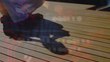 Seated woman tapping smartphone on sunlit deck with digital binary code visualizing data around her - Powered by Adobe