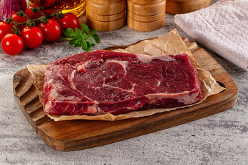 Gourmet raw rib eye steak