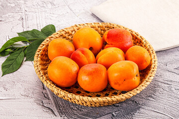 Raw ripe sweet apricots heap