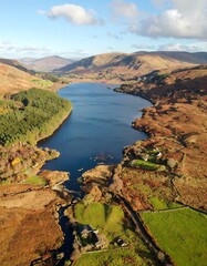 Panoramic view of a lake nestled in a valley