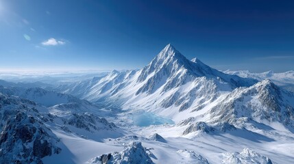 Obraz premium Snowy Mountain Peaks Cinematic HDR Winter Landscape Under Clear Blue Sky with Sunlight Glare