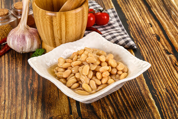 Baked white canned beans in the bowl