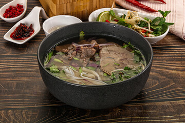 Vietnamese Pho Bo soup with beef and noodles
