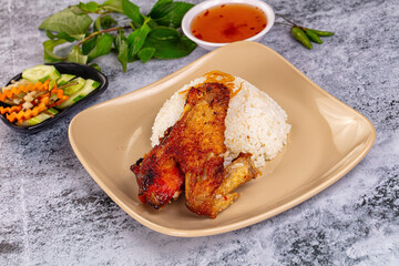 Spicy roasted chicken wing with rice