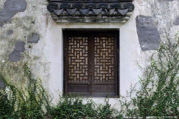Ornate Wooden Window with Intricate Latticework