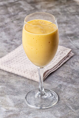Sweet mango smoothie dessert glass
