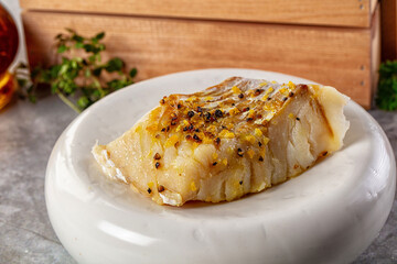 Steamed cod fish fillet with spices