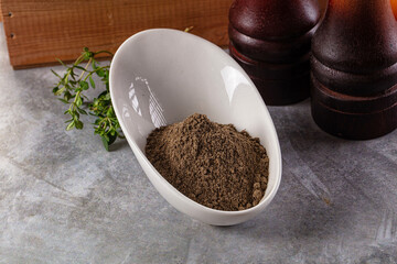 Ground dry black pepper powder