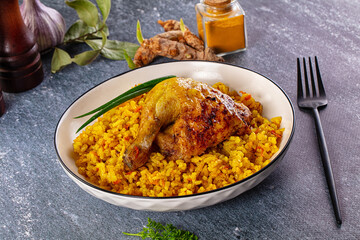 Roasted chicken leg with yellow rice