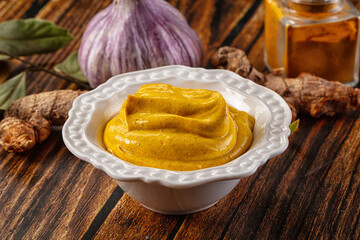 Indian yellow spicy curry sauce