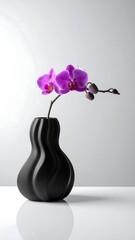 Purple orchid in dark vase