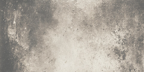 A high-resolution horizontal photograph of a textured surface, likely a concrete or weathered stone wall. The dominant colors are various shades of gray.