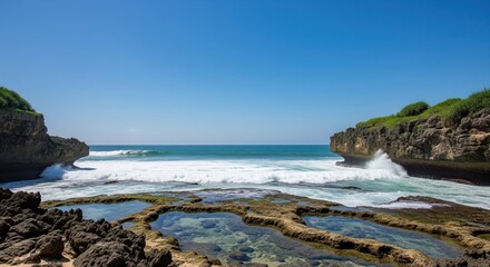 Rocky shoreline meets turquoise ocean