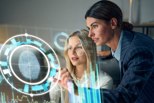 Business Analysts Examine Futuristic Biometric Fingerprint Scan And Data Visualization With Interactive Graphs And Team Collaboration