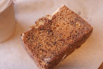Delicious coffee cake slice on a simple brown plate