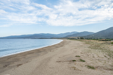 Spectacular view Golf at Sagone Corsica France beautyful sand Beach boats mountain village Tourism and vacations concept