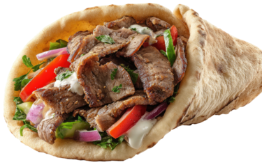 A gyro pita filled with seasoned grilled meat, vegetables, and sauce