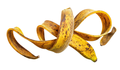 Twisted banana peel on black background