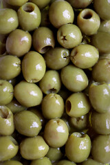 Pickled Green Olives. A healthy food for a healthy diet. Green olives pickled in olive oil.