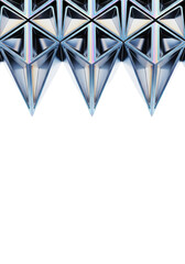 Macro shot of iridescent silver-blue metallic angular forms with sharp, reflective surfaces, arranged symmetrically on transparent background, ample copy space. Concept of modern technology