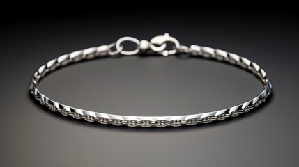 A photo of a sleek silver anklet design.