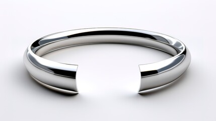 A photo of a sleek silver open cuff.