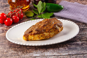 Baked chicken breast with spices and herbs