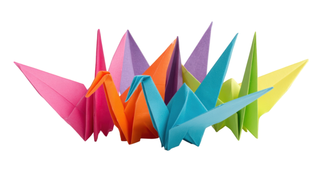 Colorful origami cranes clustered together