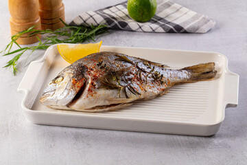 Baked dorada fish with spices