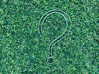 A question mark (?) with grass background, eco text effect. Ecological question. Advice and question.