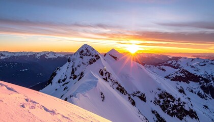 Breathtaking sunset paints snow-capped mountain peaks in vibrant hues, casting long shadows across a pristine, icy landscape