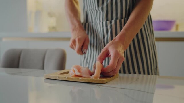 Cooking healthy food at home, woman chopping chicken meat for cutlet or soup. Dietary nutrition for stay healthy and slender, protein diet for sportsmen and people want to lose weight, home cook