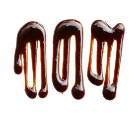 Melted chocolate letters against a black background