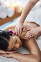 Obraz premium Hands, spa and woman with massage, wellness and zen treatment with stress relief, break and body care. People, customer and person with luxury resort, health therapy and relax with skincare and bokeh