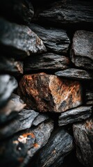 Textured stone wall; brown accent stone. Tight vertical closeup shot