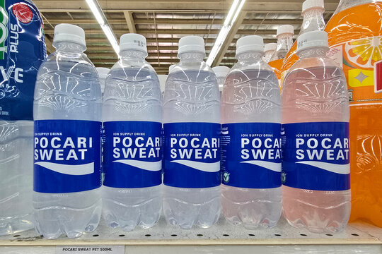 Penang, Malaysia &ndash; Sep 11, 2025: Close-up view of Pocari Sweat ion supply drink bottles neatly arranged on a supermarket shelf. The popular Japanese hydration beverage for replenishing electrolytes.