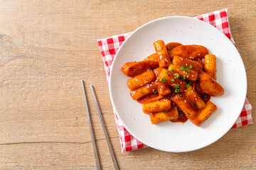 Korean rice cake stick with sausage in spicy sauce - Tteokbokki