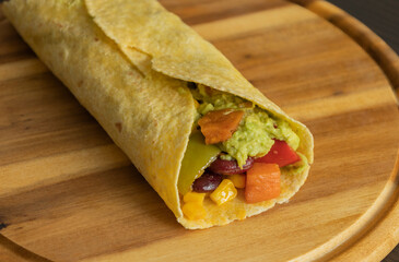 Corn Tortilla Tacos with Sweet Potato, Beans, Peppers and Smashed Avocado