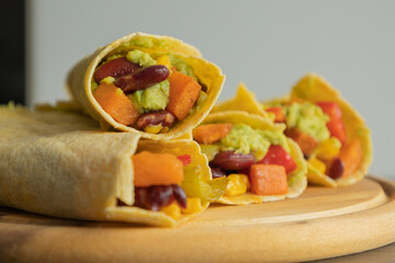 Corn Tortilla Tacos with Sweet Potato, Beans, Peppers and Smashed Avocado