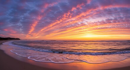 Colorful sunrise over ocean beach