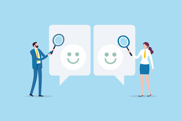 Business people examining customer feedback and satisfaction with magnifying glasses over happy smiley faces in speech bubbles