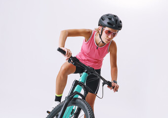 Young Woman In Professional Sportswear, Riding Her Mountain Bike