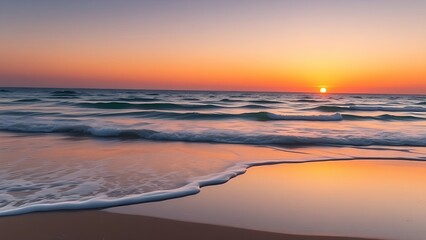 Naklejka premium Tranquil beach sunset with gentle waves, offering a peaceful and scenic escape.