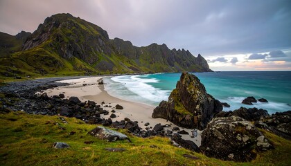 Dramatic coastal scene with dramatic mountains and waves crashing onto a beach