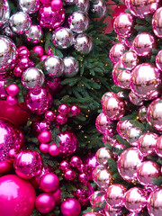 Christmas Texture or background of bright pink balls. Greeting or postcard